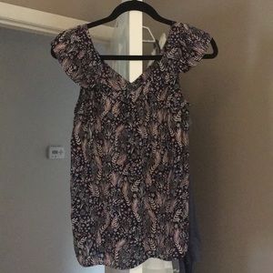 Sleeveless, flutter sleeve top.